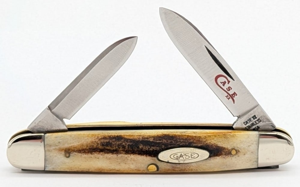 1978 Case XX Red Letter Stag Pen Senator Knife 5279: Knife is in very nice condition with light scuffs on the bolsters from handling. Overall measures 3-1/8in when closed.