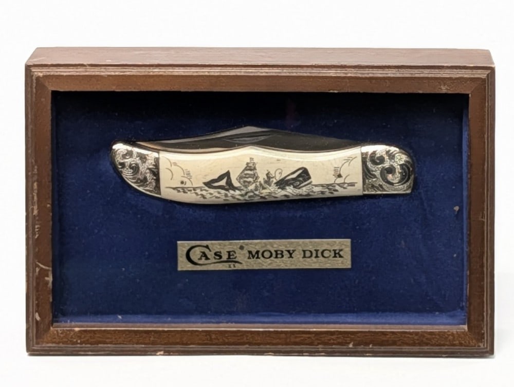 Ltd 1977 Case XX Moby Dick Scrimshaw Bone Folding Hunter w/ Case: Knife is numbered S0966, and is in very nice condition with light tarnishing from age. Overall measures 5-1/4in when closed.