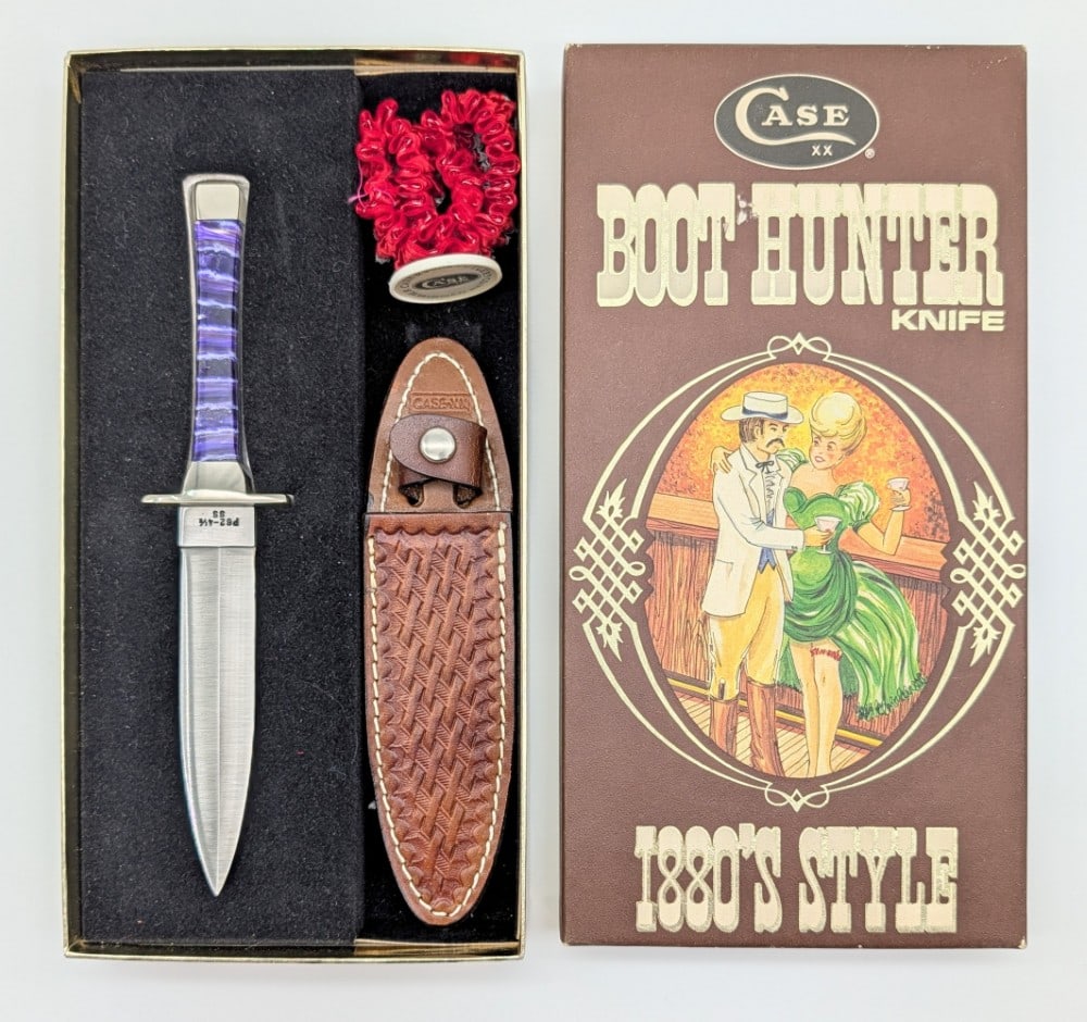 Custom Case XX Mike Newland Mammoth Tooth Boot Hunter P62-4 1/2 w/ Box: Comes in the box with the sheath and original garter. Knife is in very nice condition with minimal wear from handling. Blade length measures 4-1/2in and overall 8-3/8in.