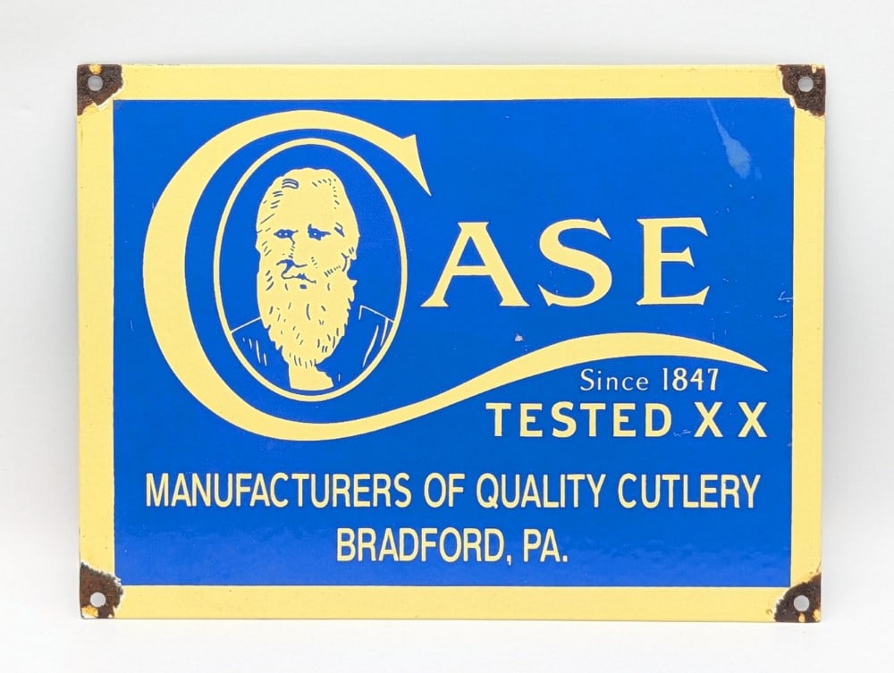 Case Tested XX Porcelain Advertising Sign: Sign is in very nice condition with purposeful worn mounting corners. Measures 11-3/4in wide x 8-3/4in tall.