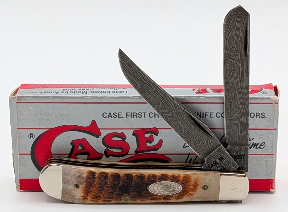 1989 Case XX Rogers Bone Damascus Mini Trapper 6207 w/ Box: Knife is in like new condition. Overall measures 3-1/2in when closed.