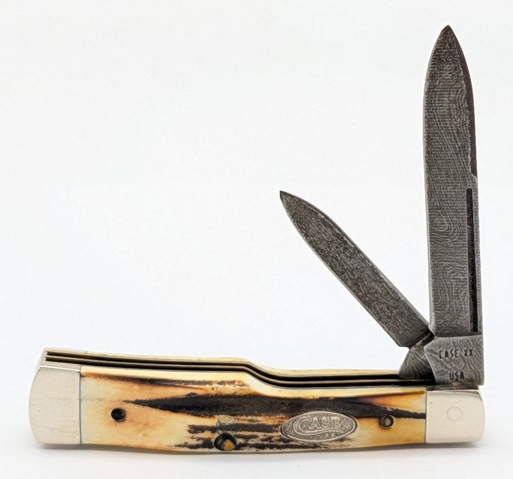 1989 Case XX Stag Damascus Small Gunstock 5215D: Knife is in very nice condition with light scuffs on the bolsters from handling. Overall measures 3in when closed.