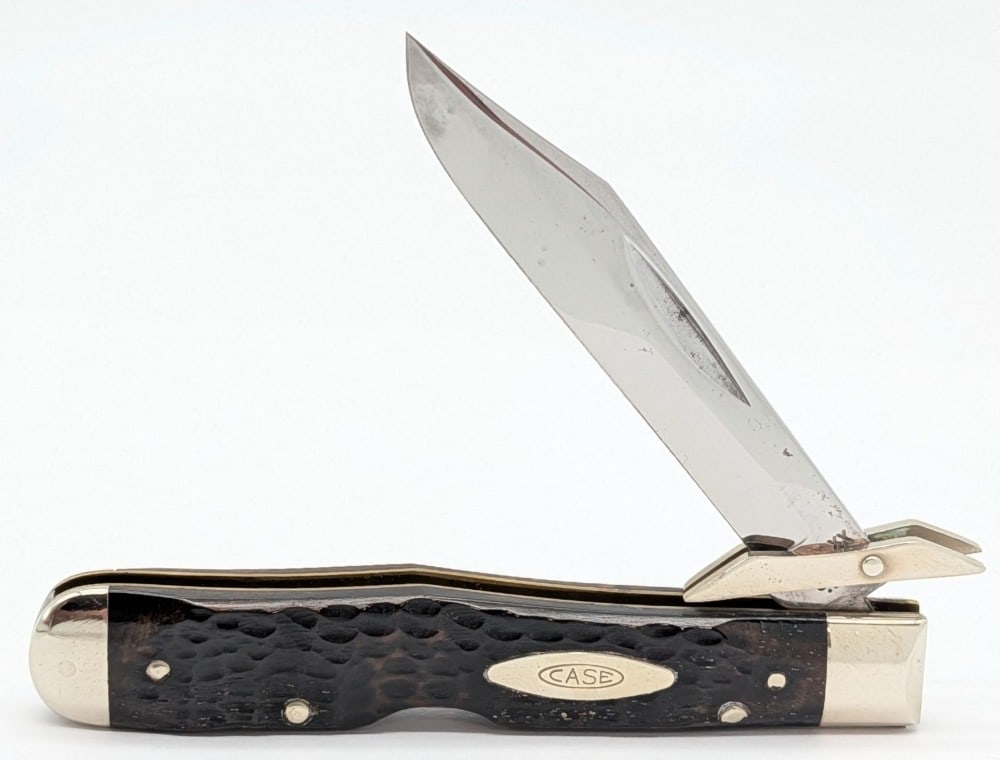 1977 Case XX Jigged Bone Cheetah 6111 1/2: Knife is in nice condition with some carbon spots on the blade, and light scuffs and tarnishing on the bolsters from handling and age. Overall measures 4-3/8in when closed.
