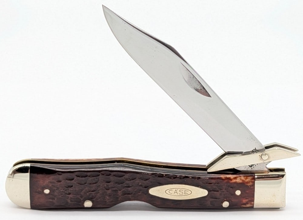 1974 Case XX Jigged Pretty Bone Cheetah 6111 1/2: Knife is in nice cleaned condition with some traces of pitting on the polished blade, and light scuffs on the polished bolsters from handling and age. Overall measures 4-3/8in when closed.