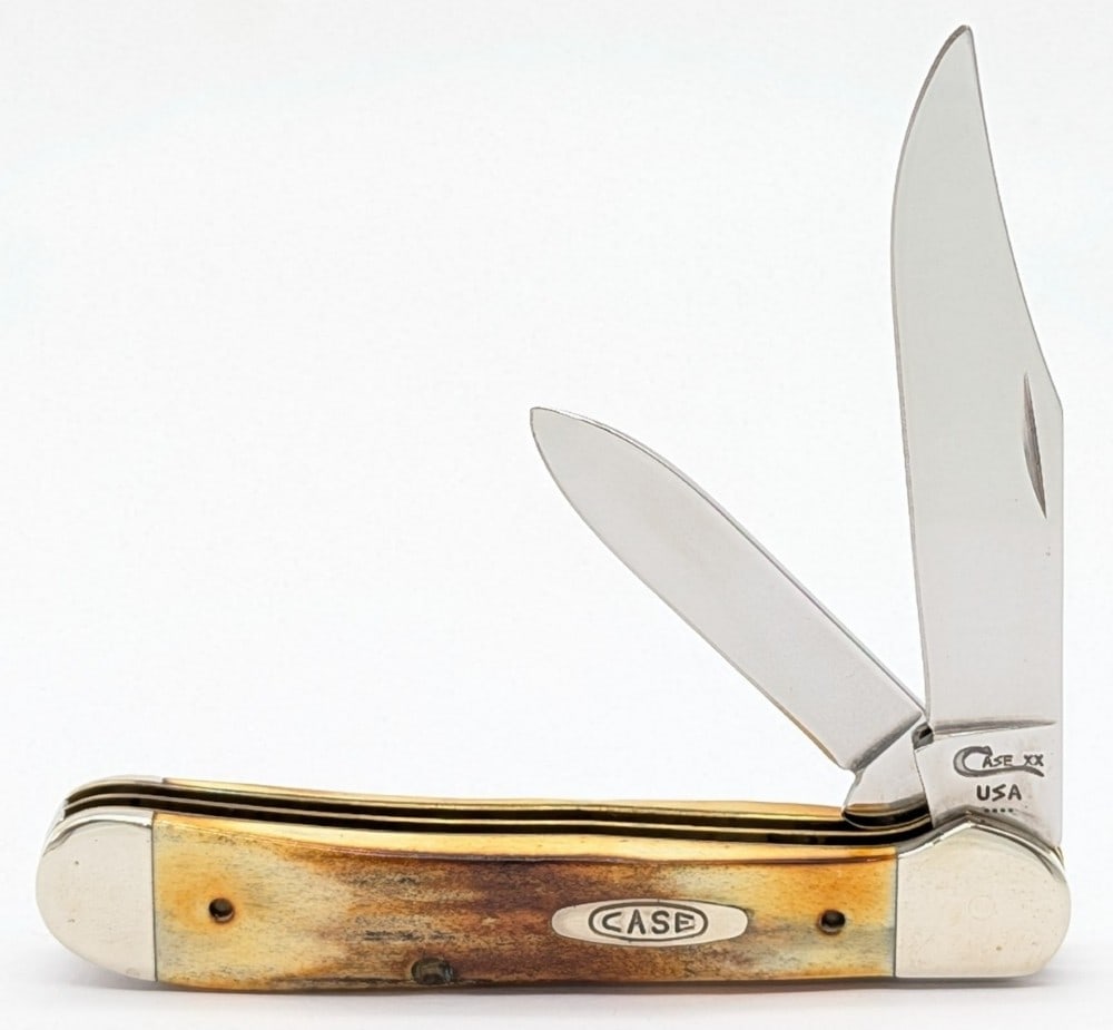 1996 Case XX Stag Copperhead 5249: Knife is in very nice condition with light scuffs on the bolsters from handling. Overall measures 3-7/8in when closed.