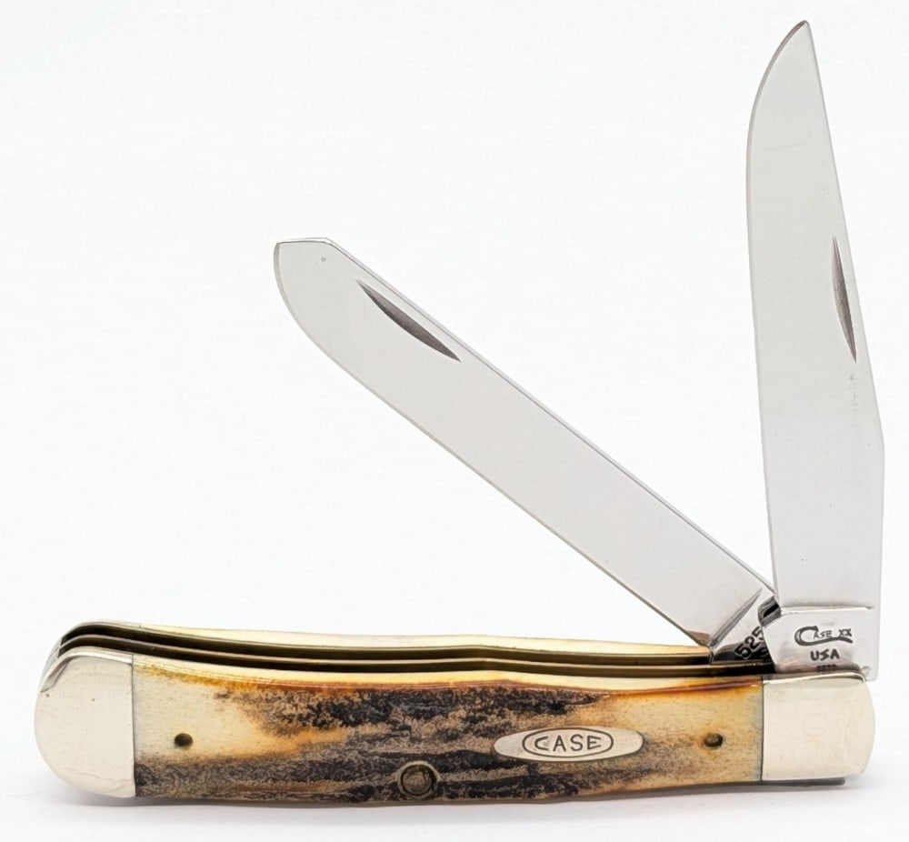 1996 Case XX Stag Trapper 5254: Knife is in very nice condition with light scuffs on the bolsters from handling. Overall measures 4-1/8in when closed.