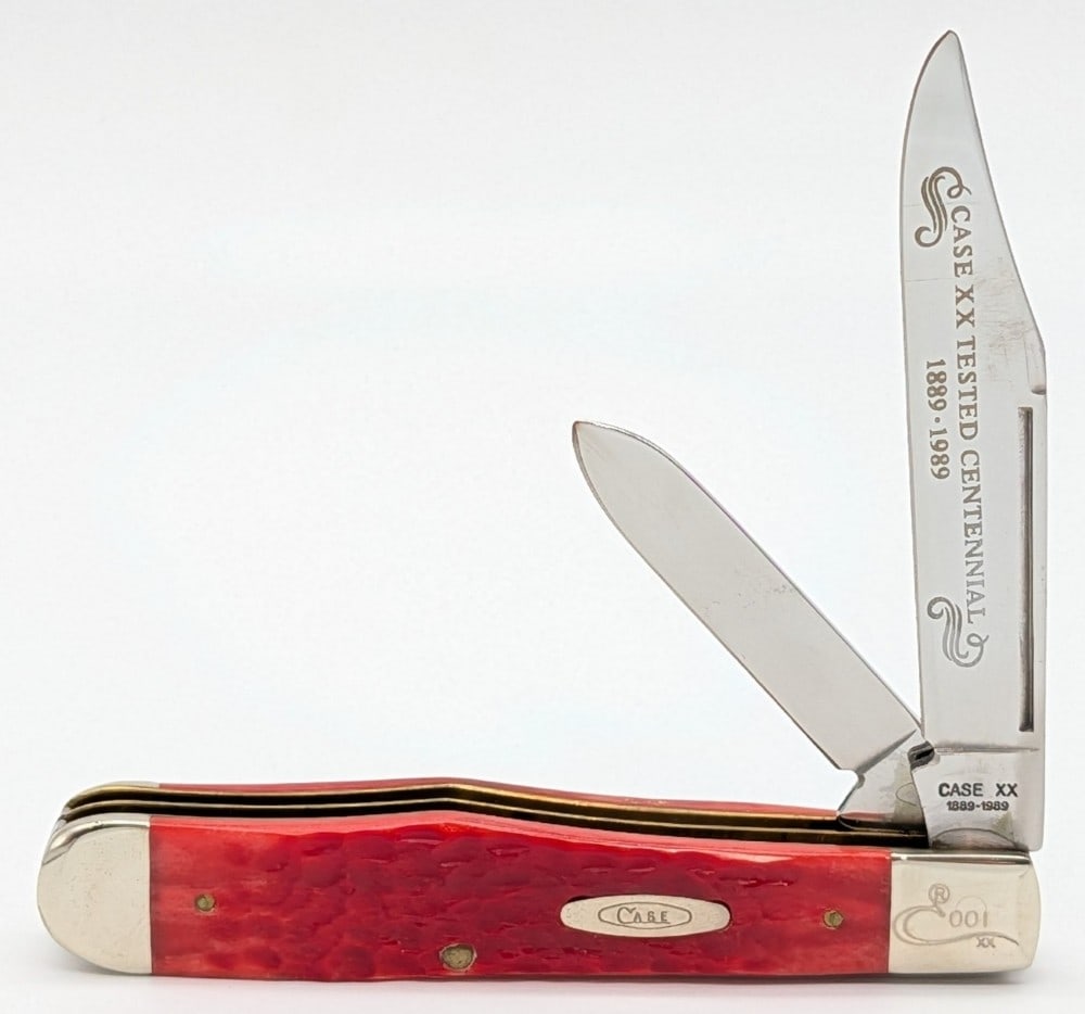 1989 Case XX Centennial Red Bone No Guard 2-Blade Cheetah R6111 1/2: Knife is numbered 001, and is in very nice condition with minimal wear from handling. Overall measures 4-3/8in when closed.