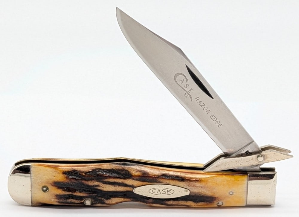 1976 Case XX Gray Letter Stag Cheetah 5111 1/2: Knife is in very nice condition with light scuffs and tarnishing on the bolsters from handling. Overall measures 4-3/8in when closed.