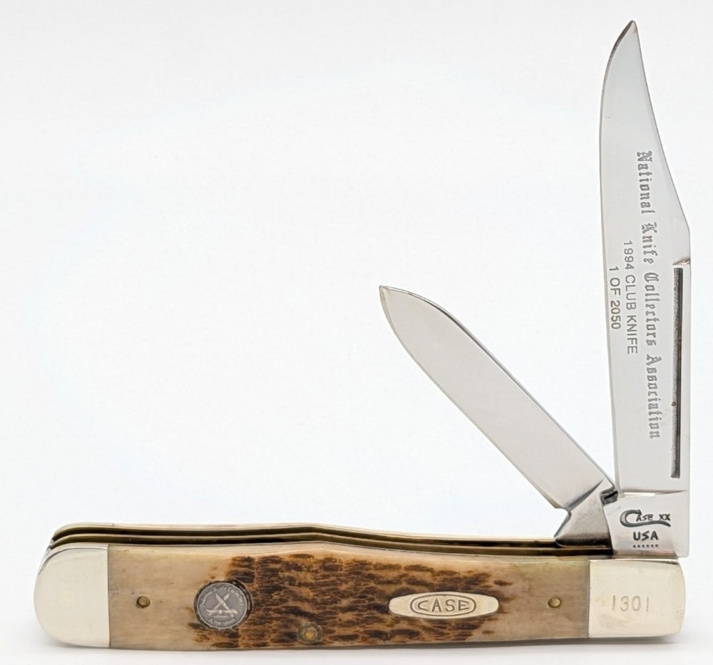 1994 Case XX NKCA Rogers Bone No Guard 2-Blade Cheetah 6211 1/2: Knife is numbered 1301, and is in very nice condition with minimal wear from handling. Overall measures 4-3/8in when closed.