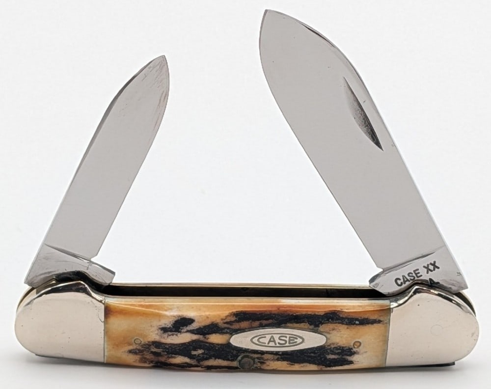 1965-69 Case XX Stag Canoe Knife 52131: Knife is in very nice condition with light scuffs from handling. Overall measures 3-5/8in when closed.