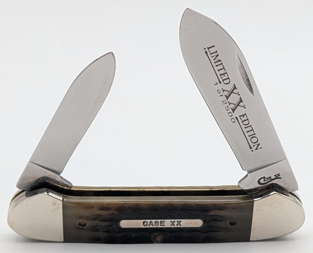 Ltd 1996 Case XX Butternut Bone Canoe Knife 62131: Knife is 1 of 2500, and is in very nice condition with light scuffs and tarnishing on the bolsters from handling. Overall measures 3-5/8in when closed.