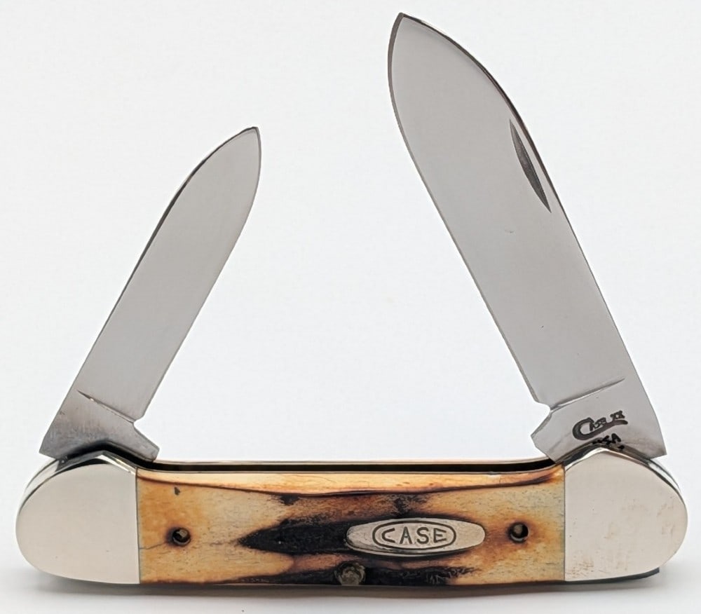 1994 Case XX Stag Canoe Knife 52131: Knife is in very nice condition with light scuffs on the bolsters from handling. Overall measures 3-5/8in when closed.