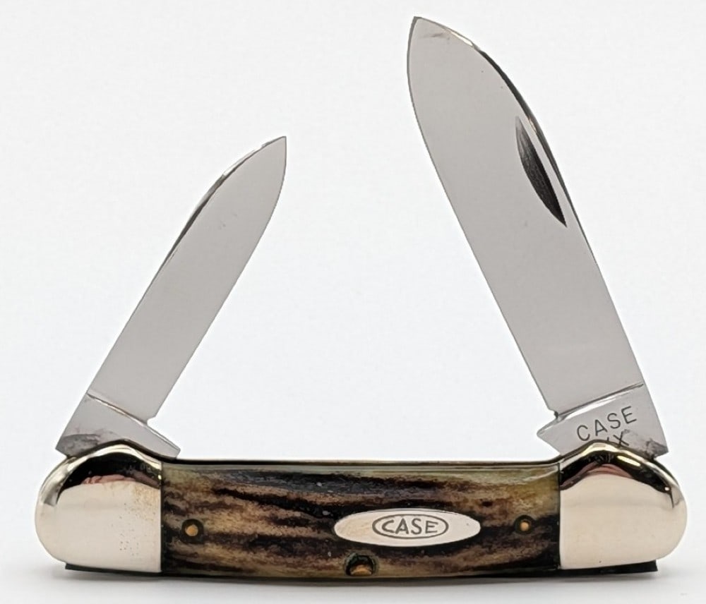 1940-64 Case XX Stag Canoe Knife 52131: Knife is in very nice condition with great blades with good snap, polished bolsters, and lightly smoothed handle scales. Overall measures 3-5/8in when closed.