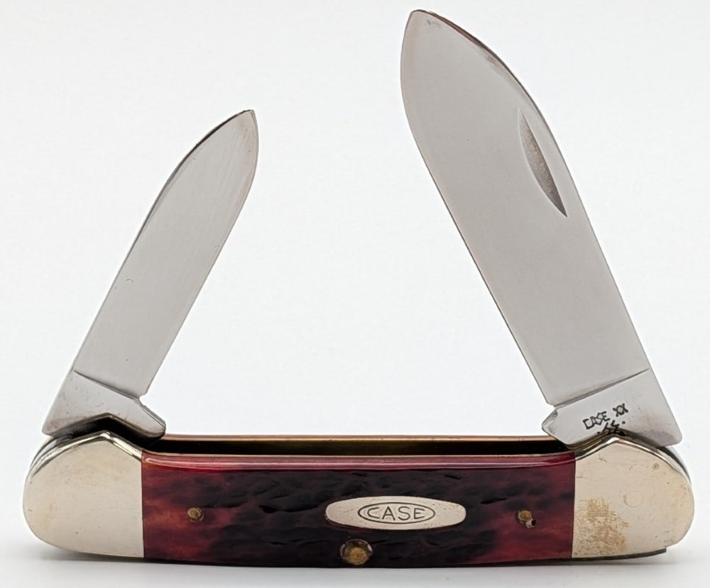 1986 Case XX Red Bone Canoe Knife 62131: Knife is in very nice condition with light scuffs from handling. Overall measures 3-5/8in when closed.