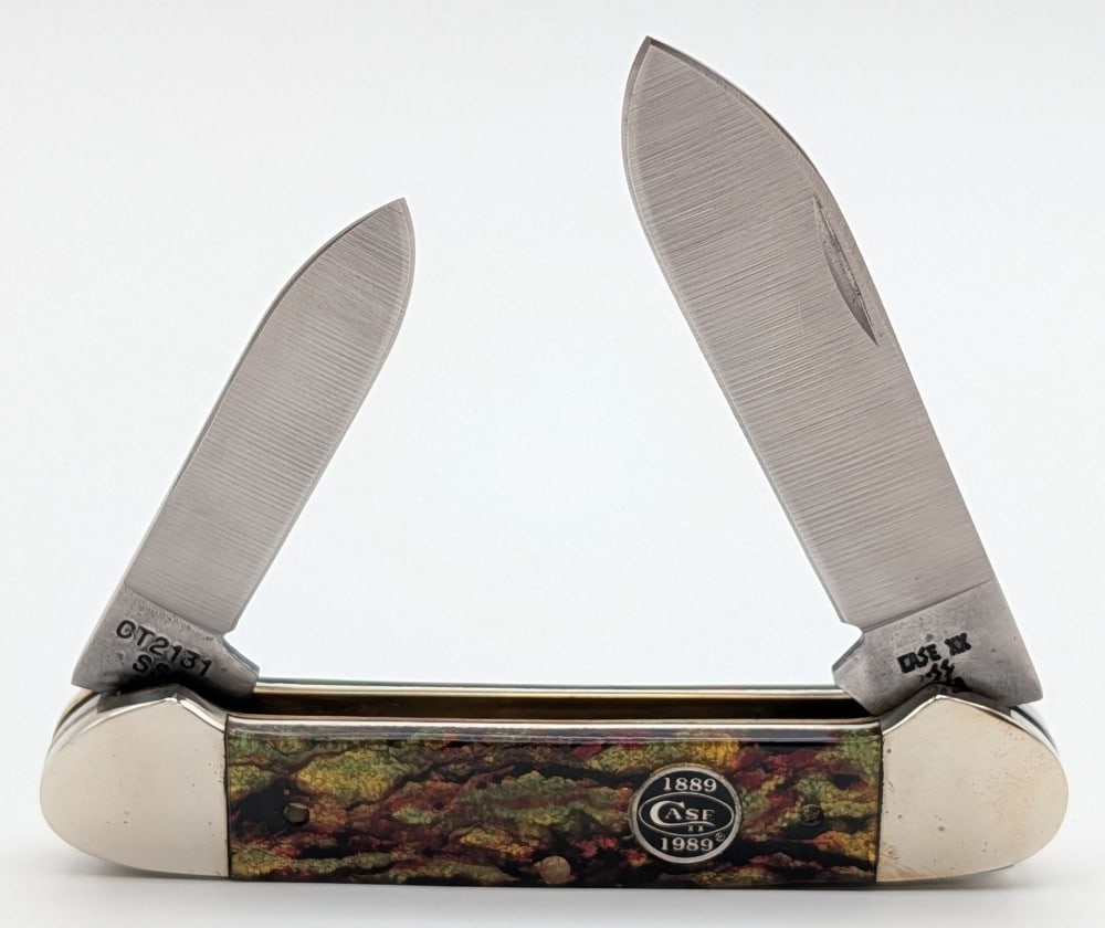 1989 Case XX Centennial Christmas Tree Celluloid Canoe Knife CT2131: Knife is in very nice condition with light scuffs from handling. Overall measures 3-5/8in when closed.