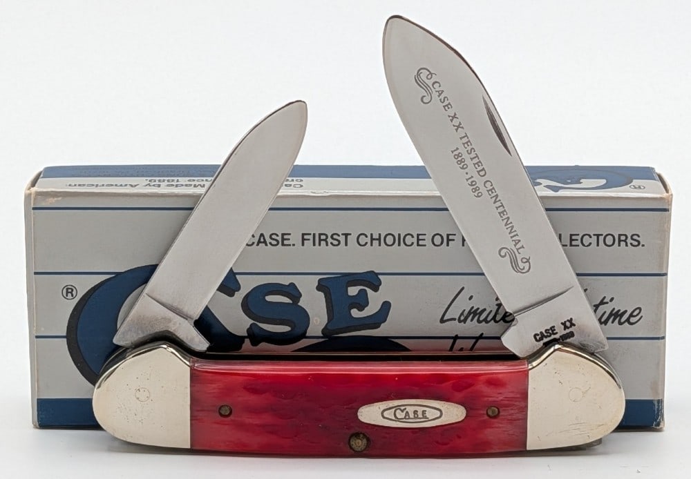 1989 Case XX Centennial Red Bone Canoe Knife R62131: Knife is in very nice condition with light scuffs on the bolsters from handling. Overall measures 3-5/8in when closed.