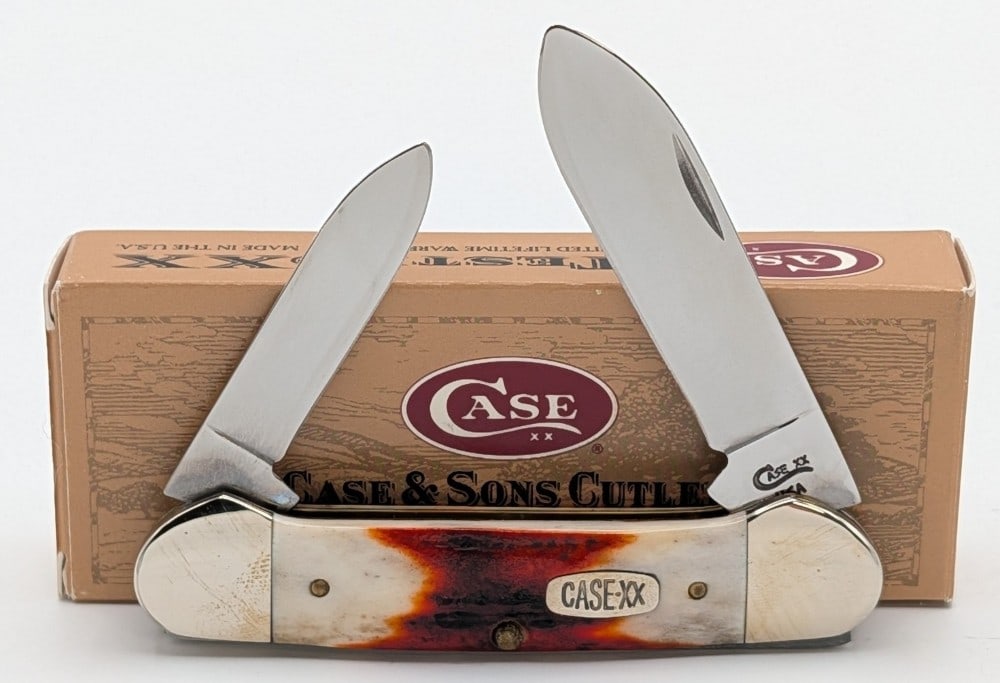 1996 Case XX Red Stag Canoe Knife R52131 w/ Box: Knife is in very nice condition with light scuffs on the bolsters from handling. Overall measures 3-5/8in when closed.
