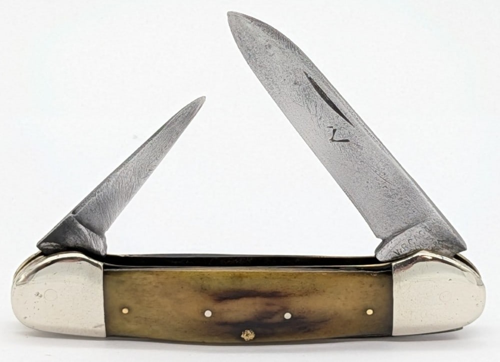 1905-14 W.R. Case & Sons Stag XX Canoe Knife 62131: Knife is in aged condition with scratches and material loss on the blades with traces of the XX stamp, scratches and dings on the polished bolsters, and a small chip on the thin edge of the back handl