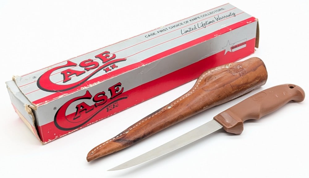 1990's Case XX 6in Fillet Knife w/ Sheath & Box: Knife is in nice condition with light scratches on the blade from use. Blade length measures 5-7/8in and overall 11-1/4in.