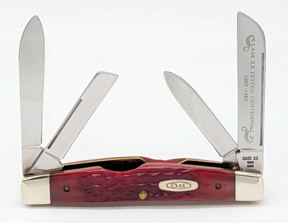 1989 Case XX Centennial Red Bone Long Pull Congress R64052: Knife is in very nice condition with light scuffs on the bolsters from handling. Overall measures 3-1/2in when closed.