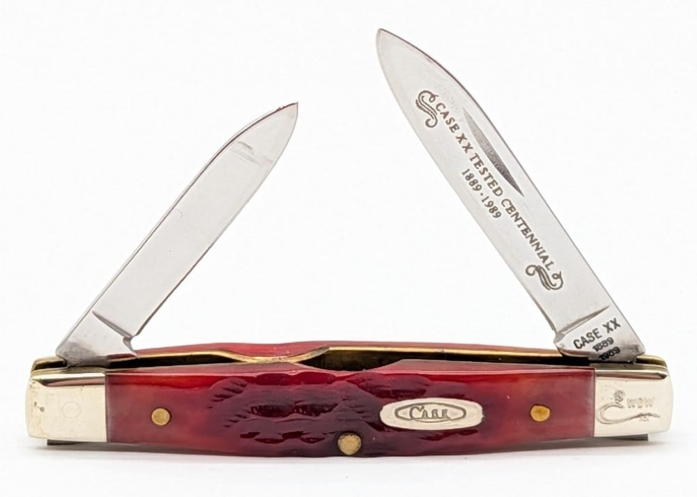 1989 Case XX Centennial Red Bone Canoe Knife R62131: Knife is in very nice condition with light scuffs on the bolsters from handling. Overall measures 3-5/8in when closed.