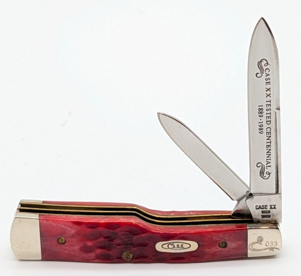 Ltd 1989 Case XX Centennial Red Bone Long Pull Small Gunstock R6215: Knife is numbered 033, and is in very nice condition with light scuffs on the bolsters from handling. Overall measures 3in when closed.