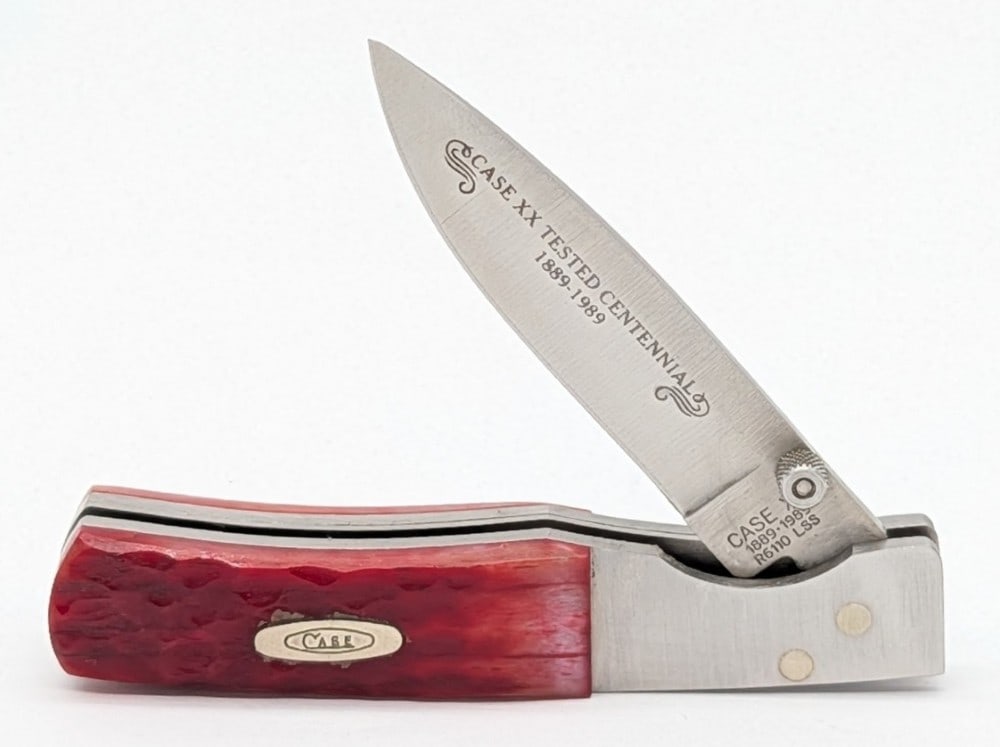 1989 Case XX Centennial Red Bone Linerlock R6110: Knife is in very nice condition with light scuffs on the bolsters from handling. Overall measures 3-1/2in when closed.