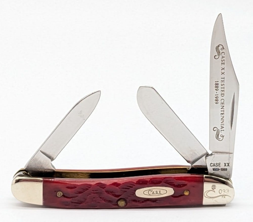 Ltd 1989 Case XX Centennial Red Bone Medium Stockman R63087: Knife is numbered 033, and is in very nice condition with light scuffs on the bolsters from handling. Overall measures 3-3/8in when closed.