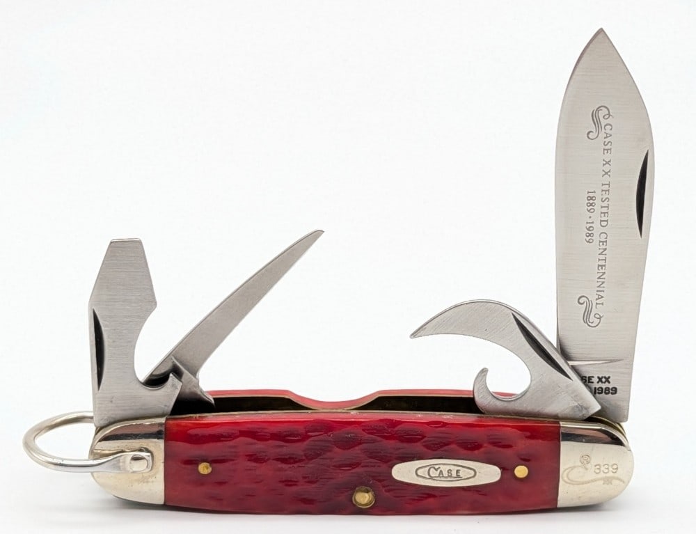 Ltd 1989 Case XX Centennial Red Bone Scout Camp Knife R640045: Knife is numbered 339, and is in very nice condition with light scuffs on the bolsters from handling. Overall measures 3-3/4in when closed.