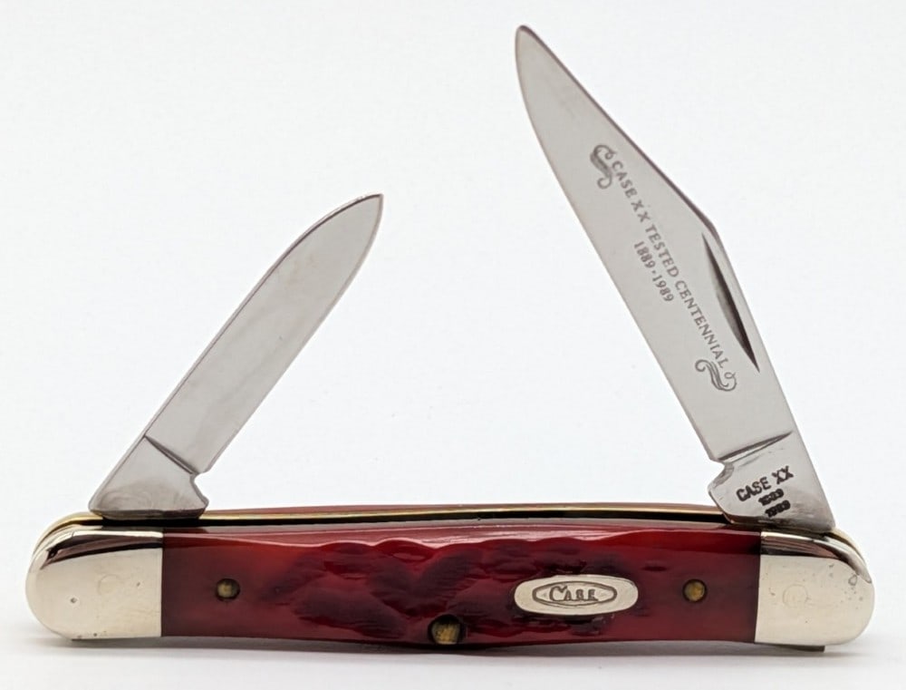 1989 Case XX Centennial Red Bone Half Whittler R6208: Knife is in very nice condition with light scuffs on the bolsters from handling. Overall measures 3-1/4in when closed.