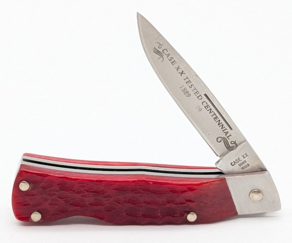 1989 Case XX Centennial Red Bone Executive Lockback R61059L: Knife is in very nice condition with light scuffs on the bolsters from handling. Overall measures 3-1/8in when closed.