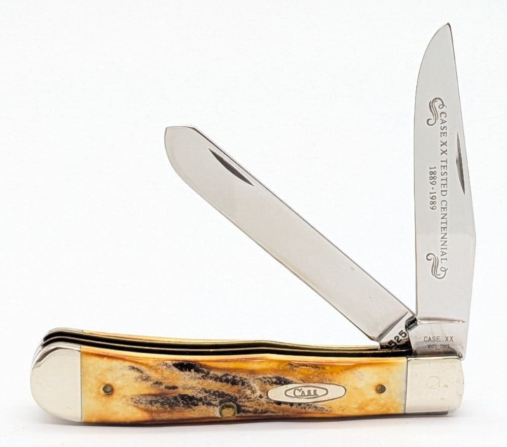 1989 Case XX Centennial Stag Trapper 5254: Knife is in very nice condition with light scuffs on the bolsters from handling. Overall measures 4-1/8in when closed.