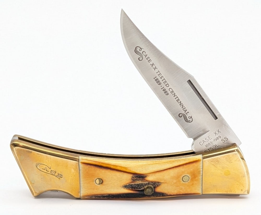 1989 Case XX Centennial Stag Hammerhead Lockback 5159: Knife is in very nice condition with light scuffs and general tarnishing on the bolsters from handling. Overall measures 4-7/8in when closed.