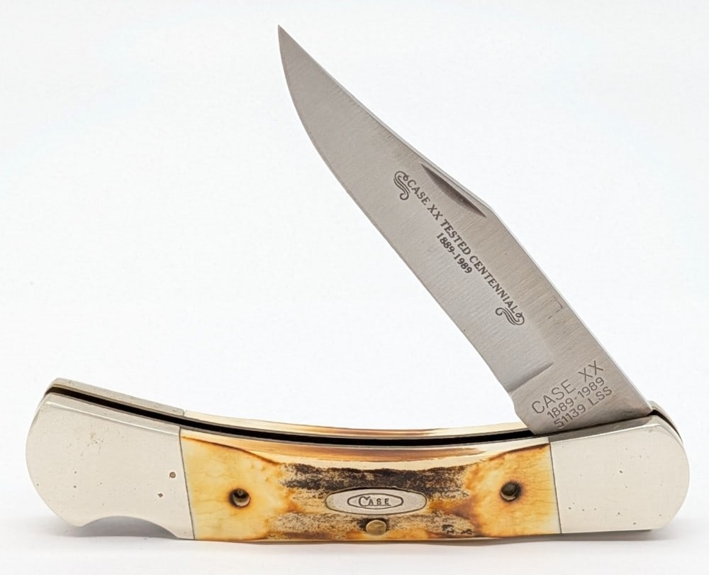 1989 Case XX Centennial Stag Lockback 51139: Knife is in very nice condition with light scuffs and some tarnishing on the bolsters from handling. Overall measures 4-7/8in when closed.