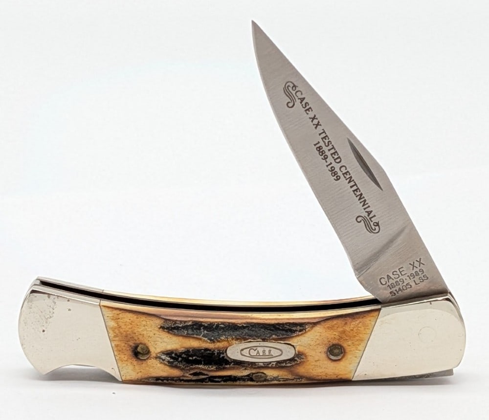Ltd 1989 Case XX Centennial Stag Small Caliber Lockback 51405: Knife is in very nice condition with light scuffs and some tarnishing on the bolsters from handling. Overall measures 3-3/4in when closed.