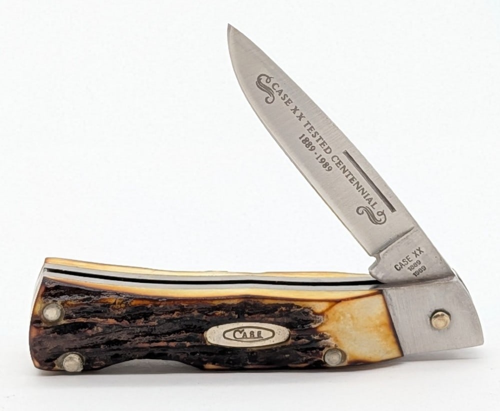 Ltd 1989 Case XX Centennial Stag Executive Lockback 51059: Knife is in very nice condition with light scuffs and scratches on the bolsters from handling. Overall measures 3-1/8in when closed.