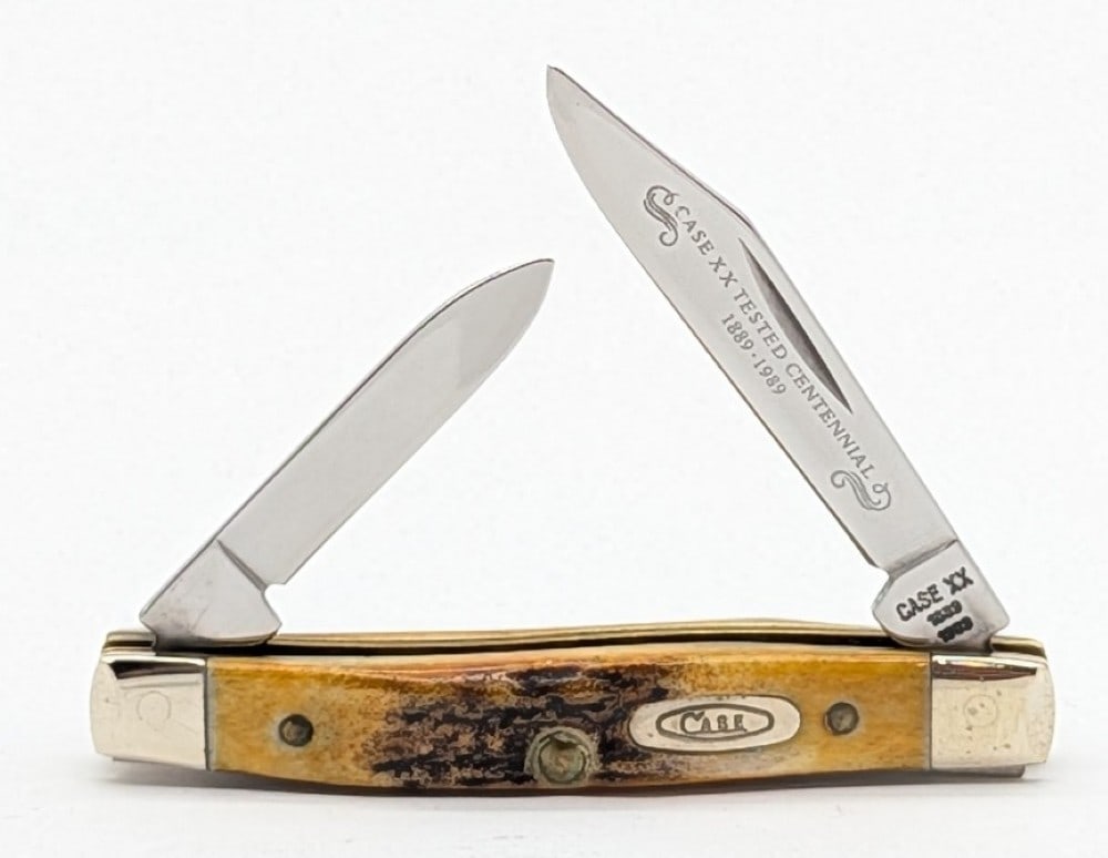 1989 Case XX Centennial Stag Small Pen Knife 5233: Knife is in very nice condition with light scuffs and some tarnishing on the bolsters from handling. Overall measures 2-5/8in when closed.