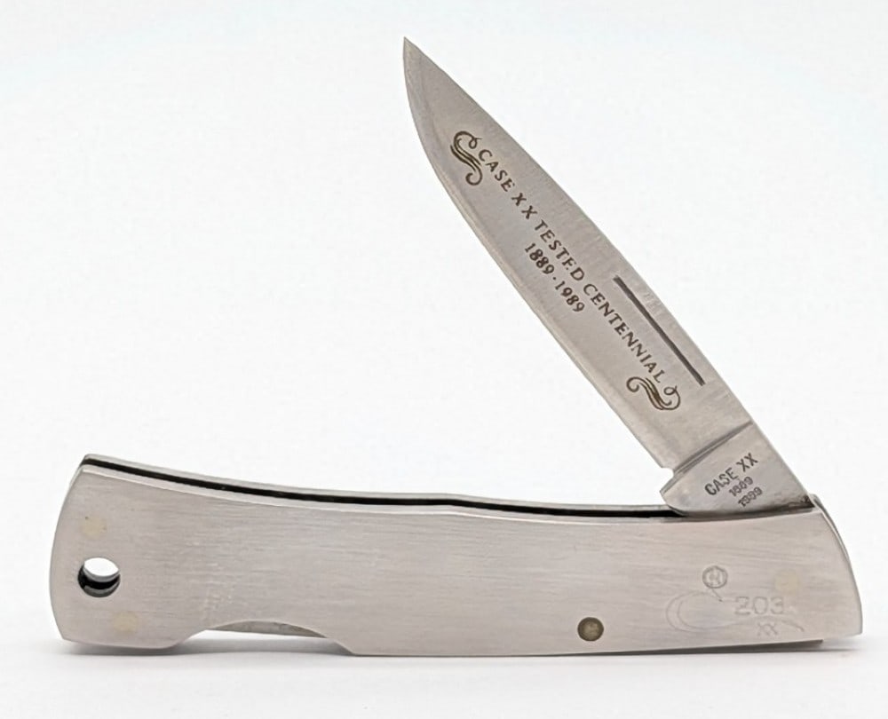 Ltd 1989 Case XX Centennial Metal Executive Lockback 059L: Knife is numbered 203, and is in very nice condition with light scuffs from handling. Overall measures 3-1/8in when closed.