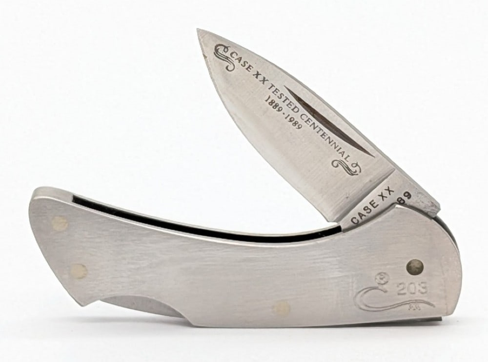 Ltd 1989 Case XX Centennial Metal Small Lockback M1056: Knife is numbered 203, and is in very nice condition with light scuffs from handling. Overall measures 2-1/2in when closed.