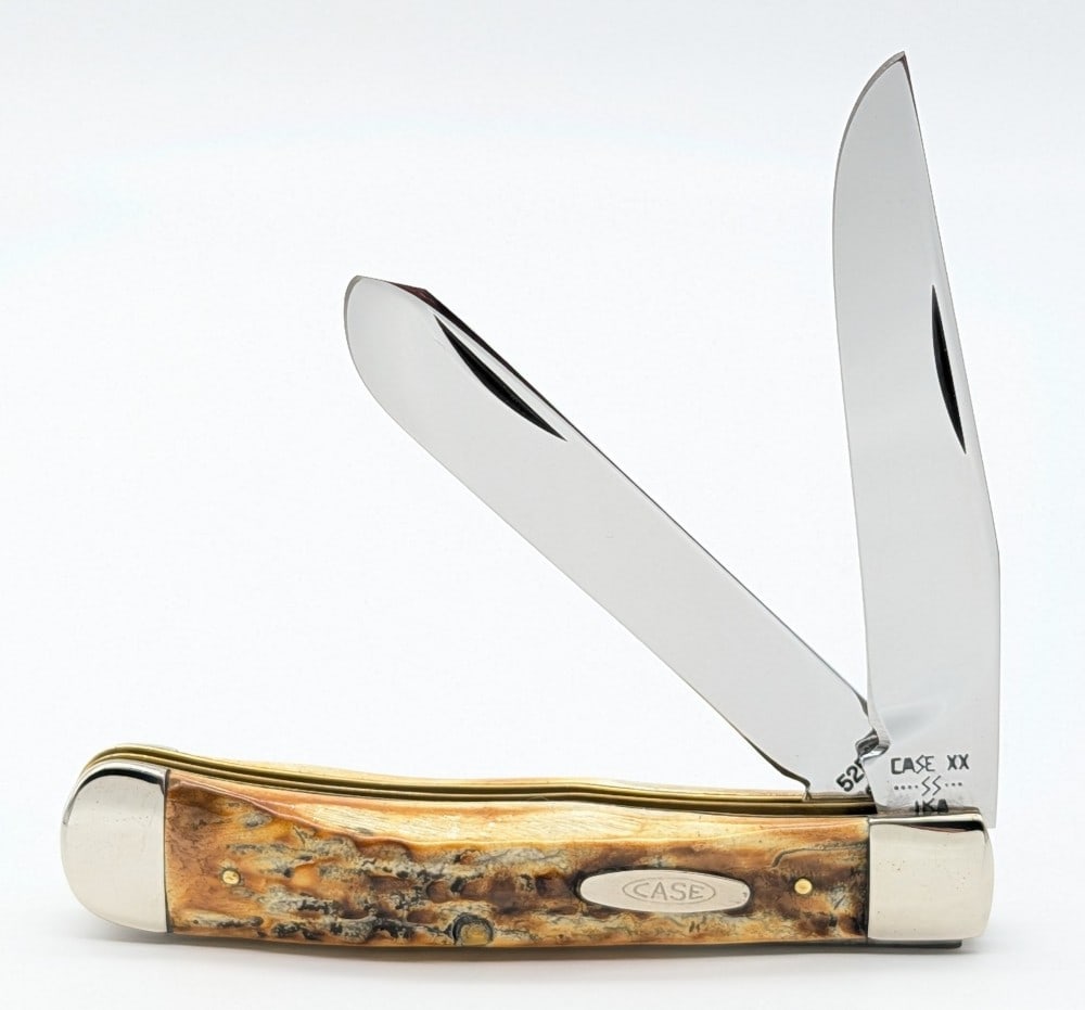 1983 Case XX Stag New Grind Trapper 5254: Knife is in nice condition with light scuffs and tarnishing on the bolsters from handling and age. Overall measures 4-1/8in when closed.
