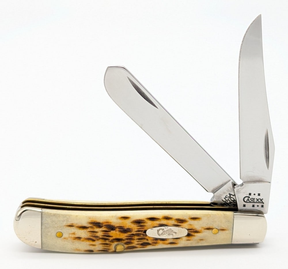 Ltd 2003 Case XX Amber Bone Mini Trapper 6207: Knife is numbered 018, and is in very nice condition with minimal scuffs from handling. Overall measures 3-1/2in when closed.