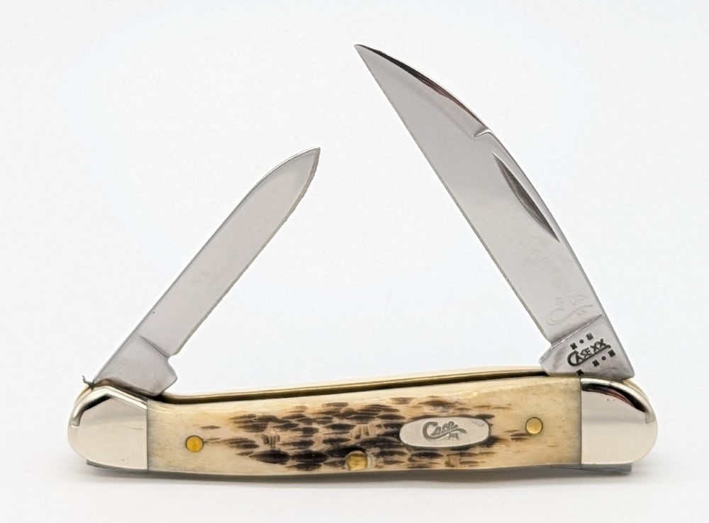 Ltd 2003 Case XX Amber Bone Wharncliffe Copperhead 62109W: Knife is numbered 018, and is in very nice condition with minimal scuffs from handling. Overall measures 3-1/8in when closed.
