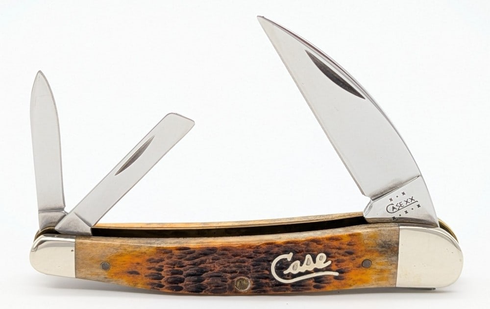 2002 Case XX Silver Script Autumn Bone Seahorse Whittler 6355WH: Knife is in very nice condition with minimal wear from handling. Overall measures 3-7/8in when closed.