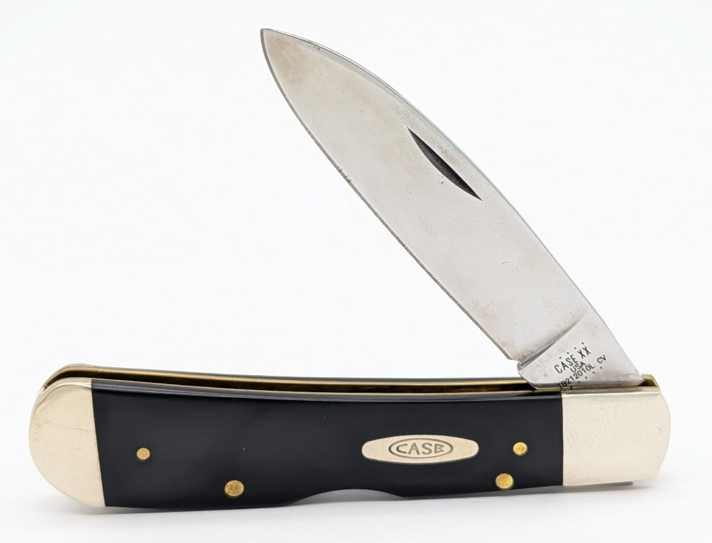 2021 Case XX Tony Bone Smooth Black Tribal Spear TB212010: Knife is in good used condition with scratches and tarnishing on the bolsters, scratches on the scales, and tarnishing on the blade. Overall measures 4-1/8in when closed.