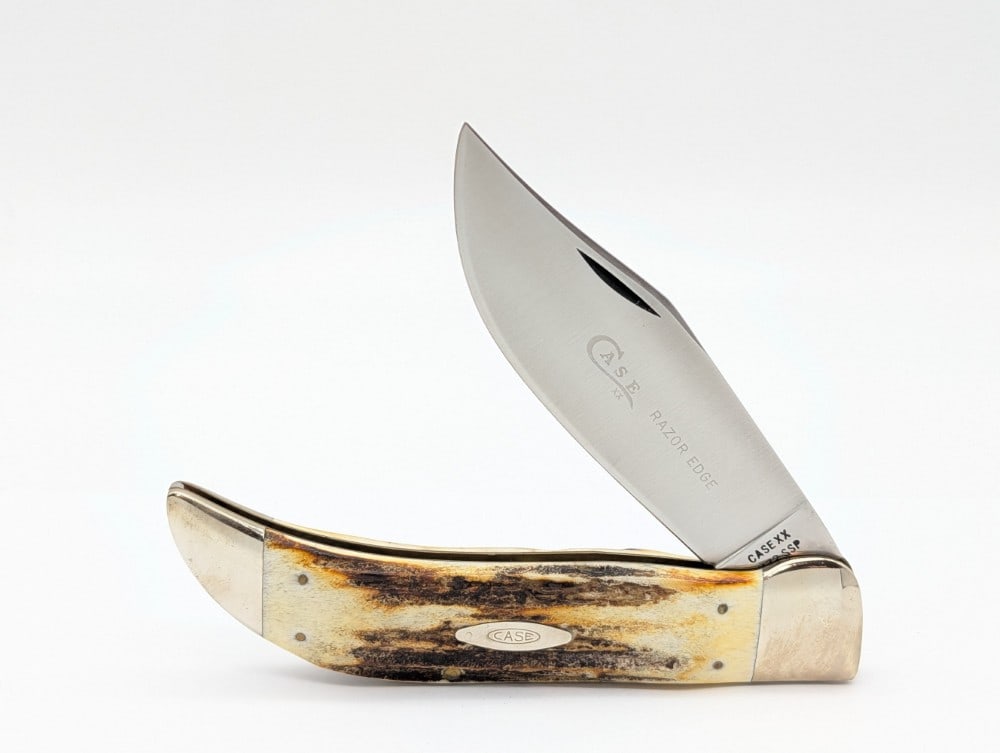 1976 Case XX Gray Letter Stag Large Folding Clasp 5172: Knife is in nice condition with light scuffs and tarnishing on the bolsters from handling. Overall measures 5-3/8in when closed.