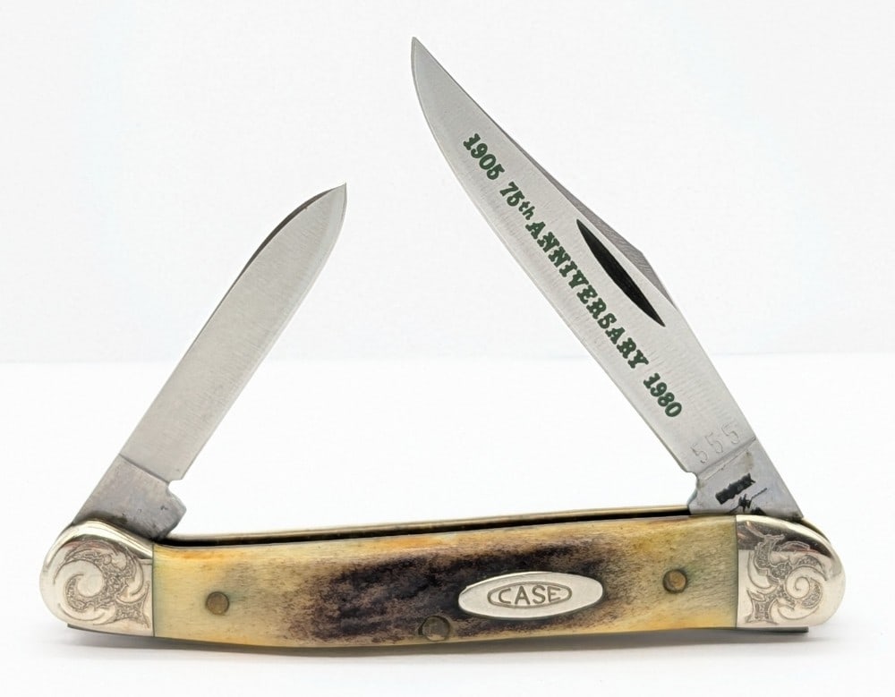 Ltd 1980 Case XX Scroll Bolster 75th Anniversary Stag Copperhead 52109X: Knife is numbered 555, and is in very nice condition with light wear from handling. Overall measures 3-1/8in when closed.