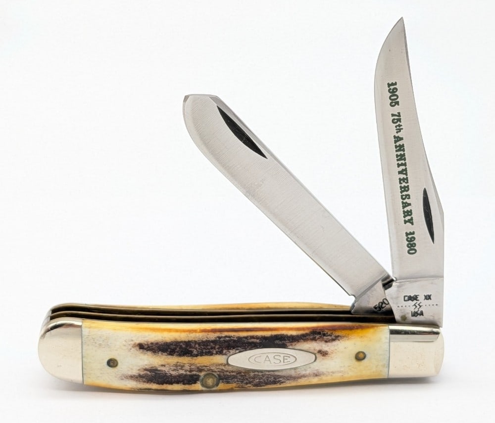 1980 Case XX 75th Anniversary Stag Mini Trapper 5207: Knife is in very nice condition with light wear from handling. Overall measures 3-1/2in when closed.