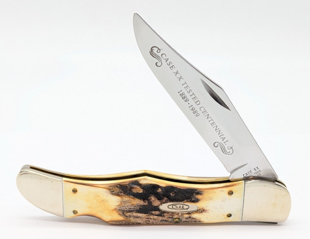 1989 Case XX Centennial Stag Folding Hunter 5165: Knife is in nice condition with light scuffs on the bolsters from handling. Overall measures 5-1/4in when closed.
