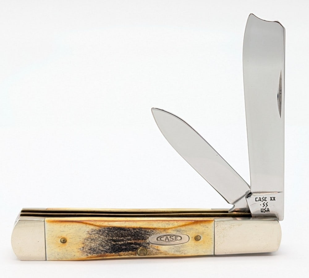1989 Case XX Stag Razor 511098: Knife is in very nice condition with light scuffs on the bolsters from handling. Overall measures 3-7/8in when closed.