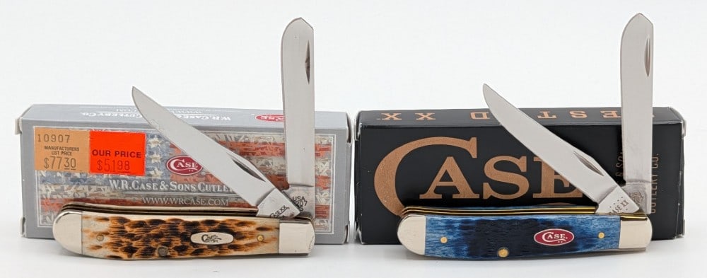 2018 & 23 Case XX Burnt Amber & Navy Blue Bone Mini Trappers 6207 w/ Boxes: Knives are in very nice condition with some light tarnishing on the burnt amber knife from age. Overall measures 3-1/2in when closed.